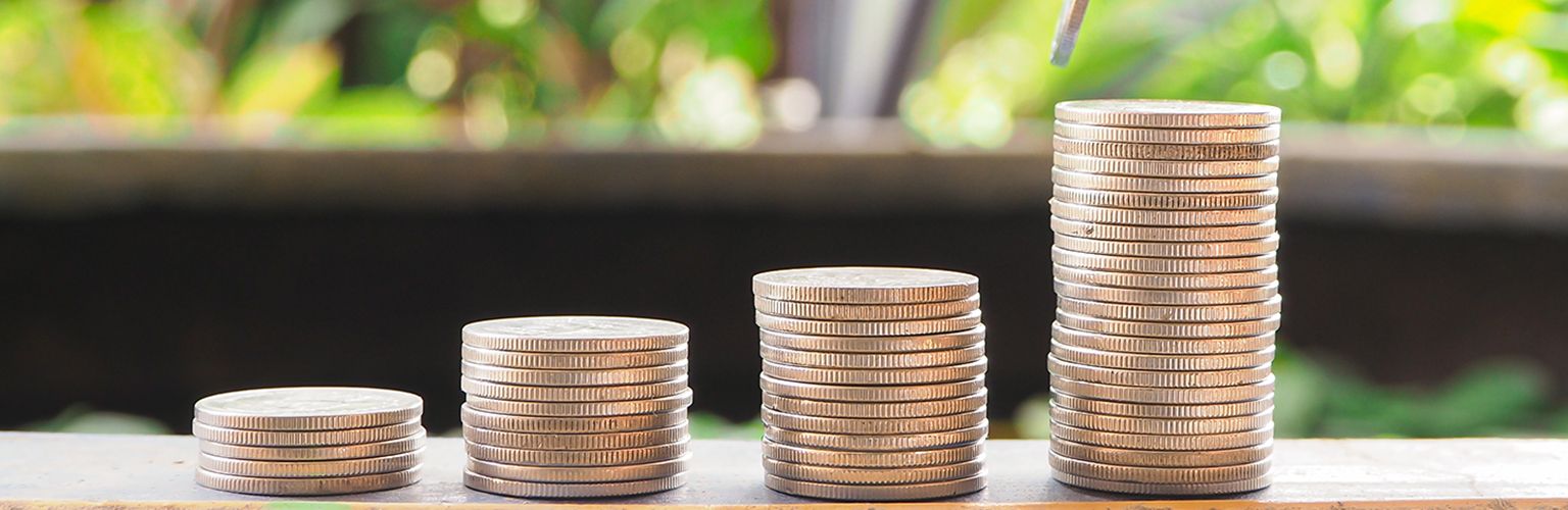 Blog Stage - Silbermünzen in 4 Stapeln