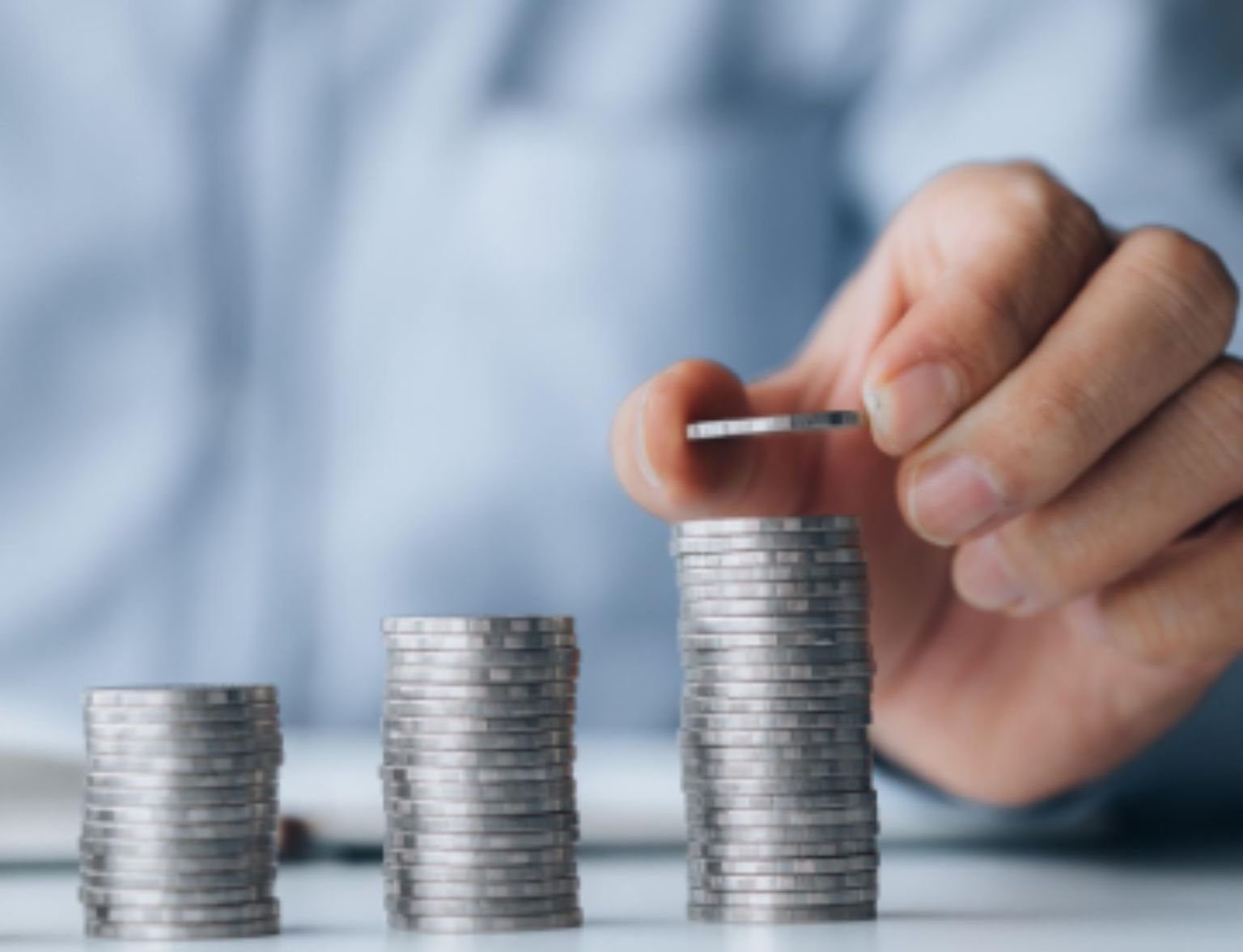 Blog Teaser - Silbermünzen stapeln aus dem Artikel Was spricht für eine gestaffelte Investition?