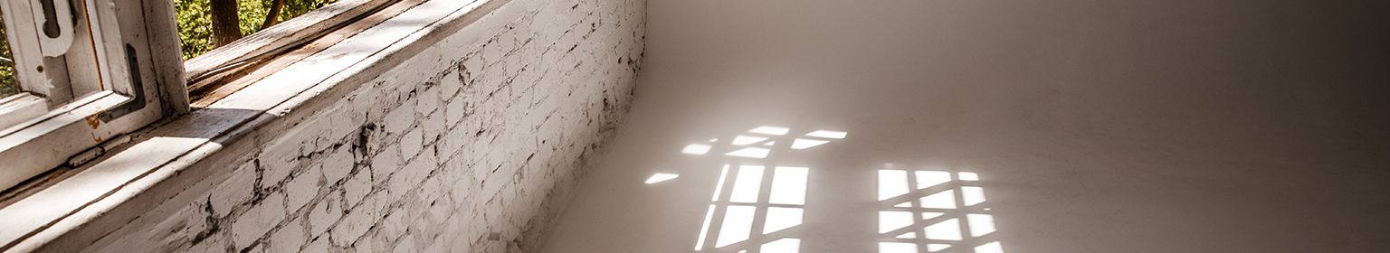 PageEnd - Wand, Gebäude und Sonne